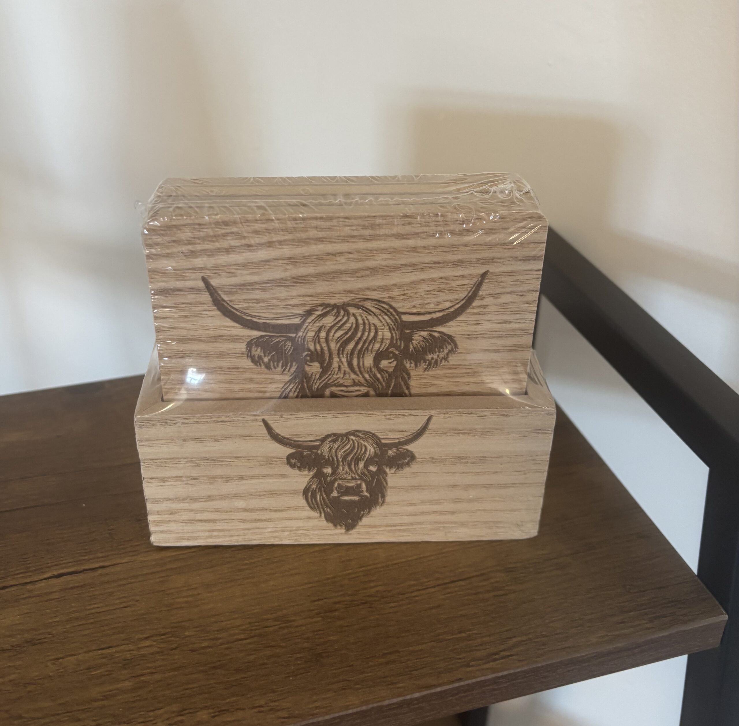 wooden highland cow coaster set